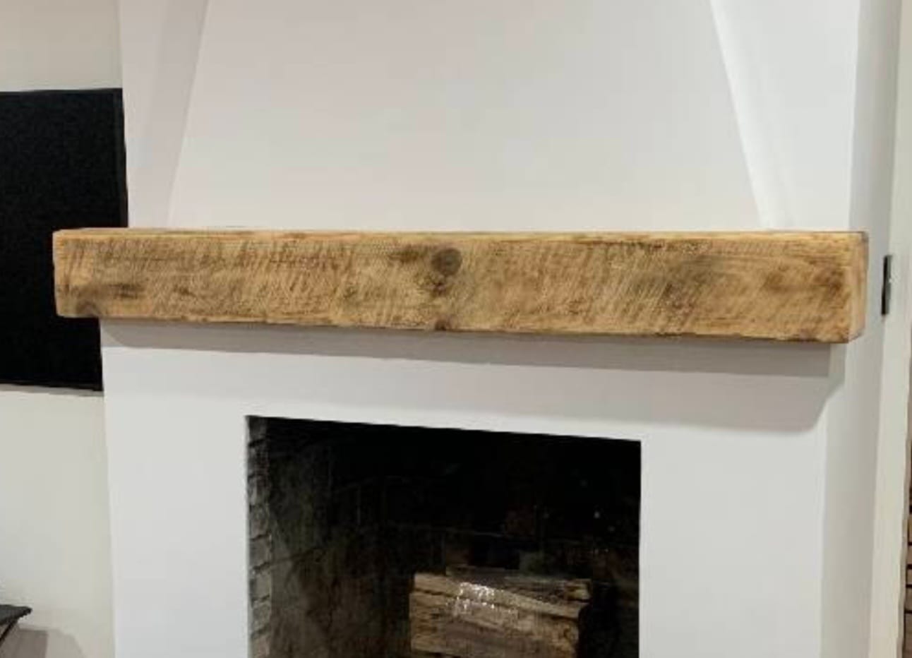 Rustic wood hand hewn barn beam mantel custom made with a reclaimed aged distressed antique look