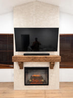Rustic wood hand hewn barn beam mantel custom made with a reclaimed aged distressed antique look